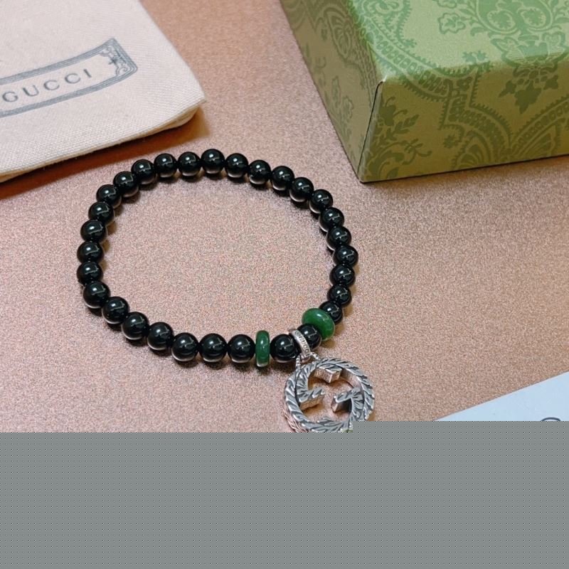 G*u*i bracelets